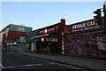 Shops on the railway bridge on West End Lane