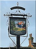 TL1314 : The Inn on the Green sign by Oast House Archive