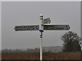 TG3332 : Signpost on C636 with cycleway information by David Pashley