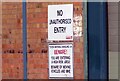 Signs on Toyota building  on Signal Road