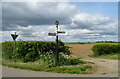 Fingerpost and field entrance near Stearsby