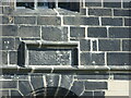 Date stone above the door of Newhall, Bradford