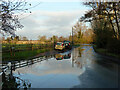 Wet road north of Paper Mill Bridge