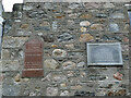 Wall plaques at Brig O