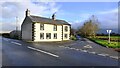 Hunters Cottage on southeast side of A686 at junction to Ousby