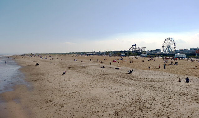 The beach and the Pleasure Beach seen from the pier, Skegness