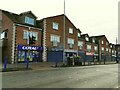 SE3533 : Shops on the south side of Selby Road, Halton by Stephen Craven
