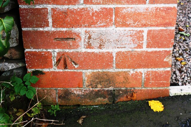 Benchmark on brick gatepost at entrance to 'Eden Hill'