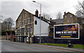 The Junction pub and a Covid warning poster, Otley Road (A6038), Baildon