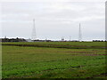 TG3233 : Arable landscape with Bacton Gas terminal on horizon by David Pashley