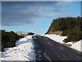 NT7666 : Snow on the Road at Ecclaw Hill by Jennifer Petrie