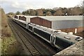 A four-coach Chiltern Railways service heading north from Warwick