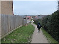 Walking a footpath through Sutton in Shrewsbury