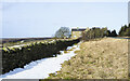 House alongside high stretch of A68