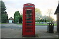 Red phone box on The Green, Southgate