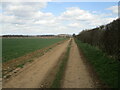 Farm track and old farm under restoration