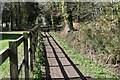 Fence shadow on the path