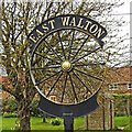 TF7416 : East Walton village sign by Adrian S Pye