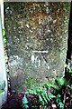 Benchmark on gatepost at entrance to Slatequarry Wood from bend in rural road