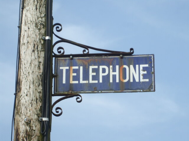 Old enamel telephone sign