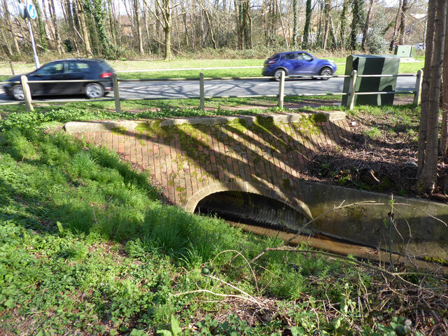 Broadfield Brook passes under Tollgate Hill, Broadfield, Crawley