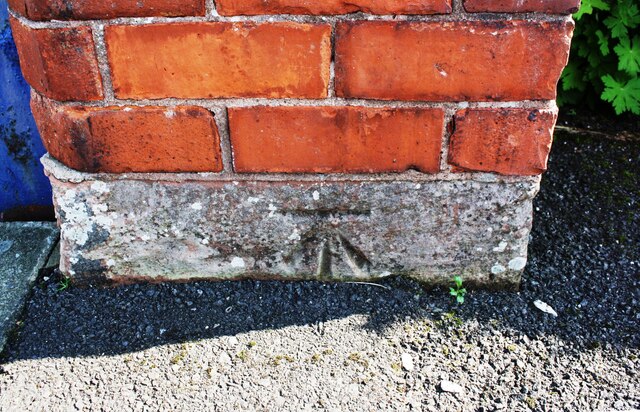 Benchmark on gatepost  base at entrance to Council depot yard, Boustead's Grassing