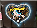 View of Bubbles the Powerpuff Girl street art on a wall off Holywell Lane