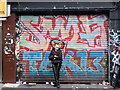 View of shutter art on Brick Lane