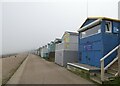 Beach huts in the fog, Whitstable