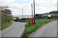 Telephone box and bench at the end of Tinkley Lane