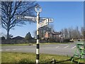 Direction Sign ? Signpost on the B5299 at Gowrie Cottages