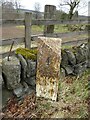 Old milepost by the A93