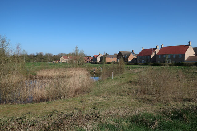 Pond and recent housing, Godmanchester