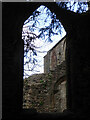 SO7740 : An empty window framing part of Little Malvern Priory by Chris Allen