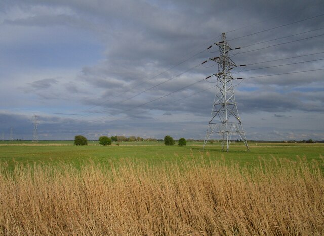 Electricity pylon in a flat landscape