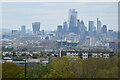 TQ4276 : View over flats at Greenwich Heights to distant City skyline by David Martin