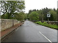 Road crossing a bridge over the River Eden as it leaves Springfield