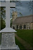 TM4365 : St Peter's church, Theberton, and the village war memorial by Christopher Hilton