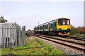 Bedford to Bletchley train at Wootton Broadmead Level Crossing