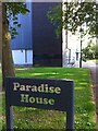 Paradise House sign and detail of tower block