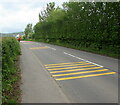 SO3202 : Yellow strips on the A472, Little Mill, Monmouthshire by Jaggery