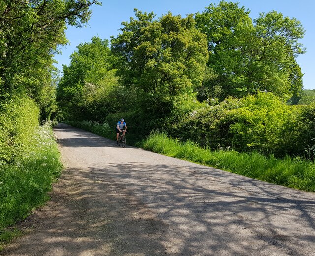 Cyclist on Mile Post Lane, Shurnock, Worcestershire