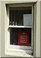 NS9885 : Notice in a window, Culross by Richard Sutcliffe