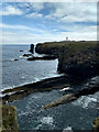 ND3855 : A view along the coast to Noss Head Lighthouse by Mick Garratt