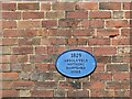 Blue plaque on outbuilding at Beaconsfield House, Burton Joyce