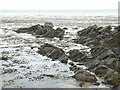 NK0662 : Coastal rocks at Inzie Head by Oliver Dixon
