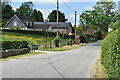 Village street past Burcombe Manor