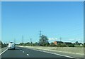 M18  southbound  brick buildings  to  right  are  sewage  works