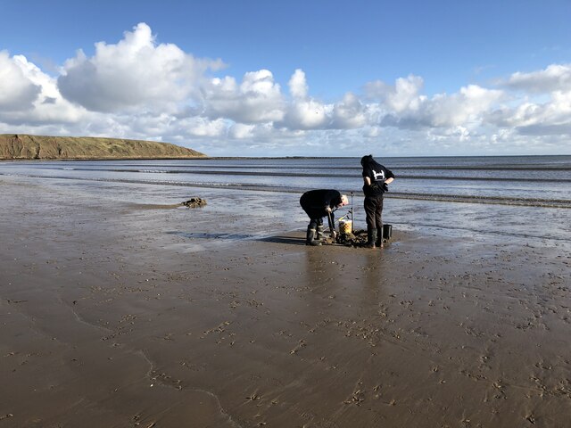 Digging for bait on Filey Beach