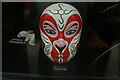 TQ3282 : View of a painted mask in the window of The Old Street Chinese Restaurant #2 by Robert Lamb